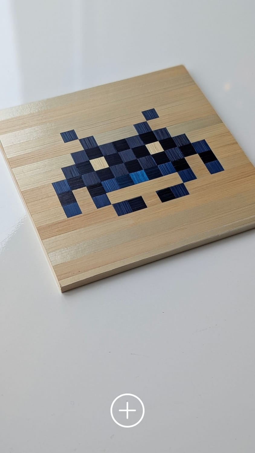 tableau pixel art en marqueterie de paille