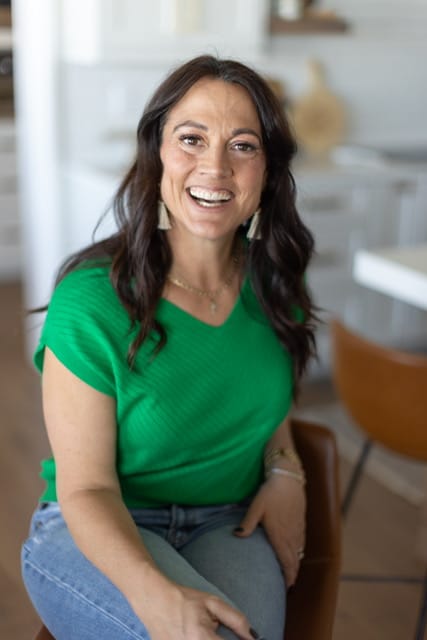 Juli Smolen smiling in a green top