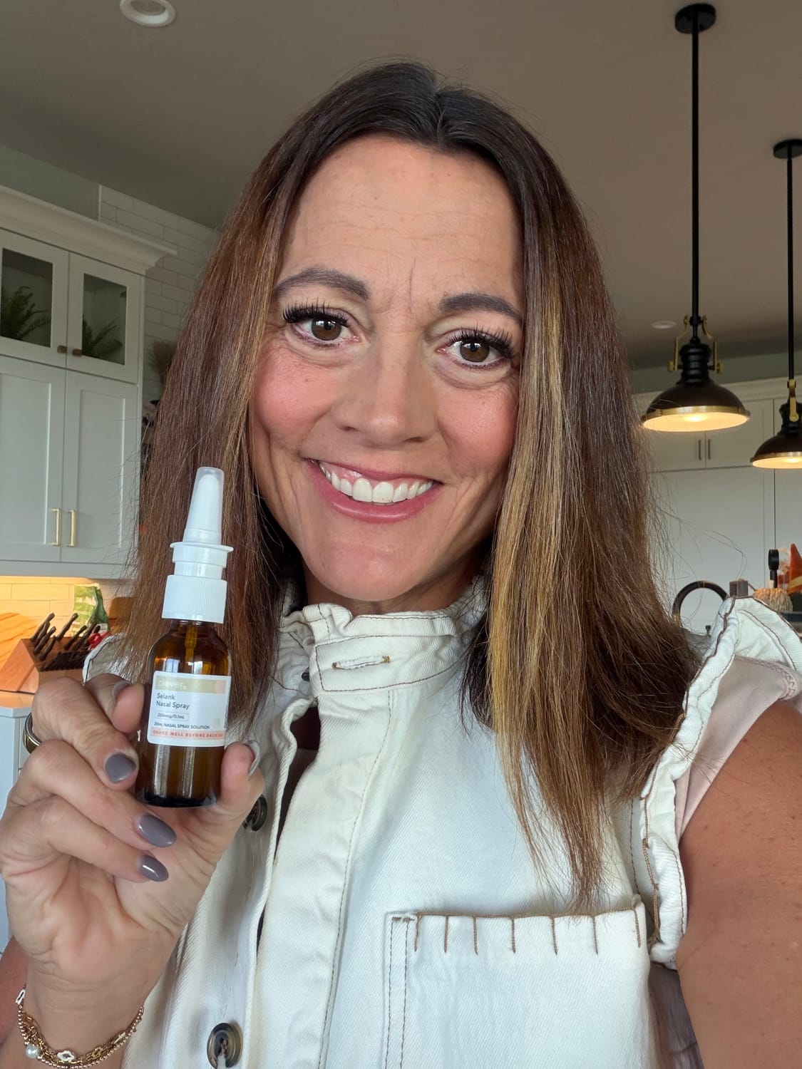 Juli holding a nasal spray
