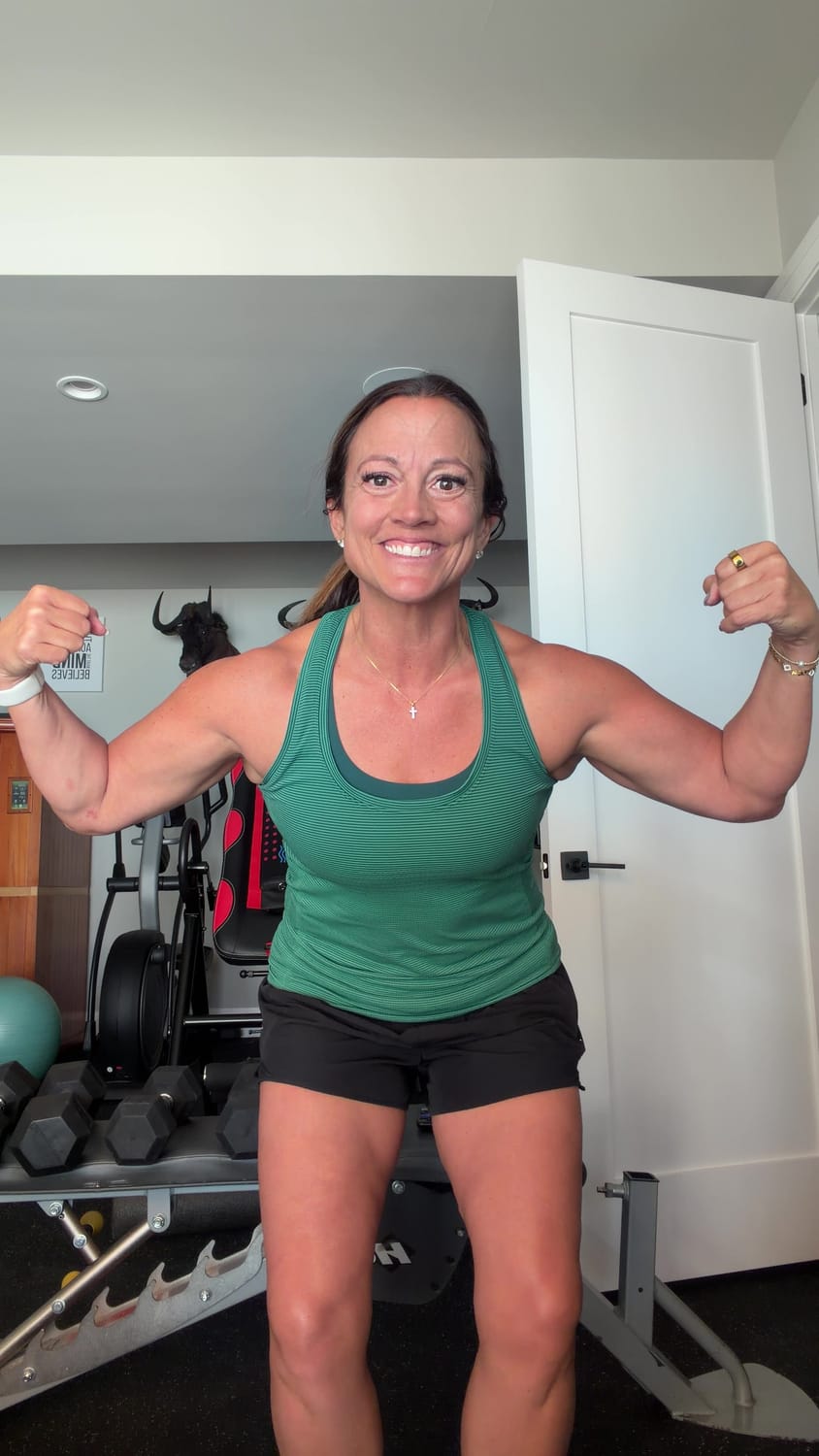 Juli flexing after a workout