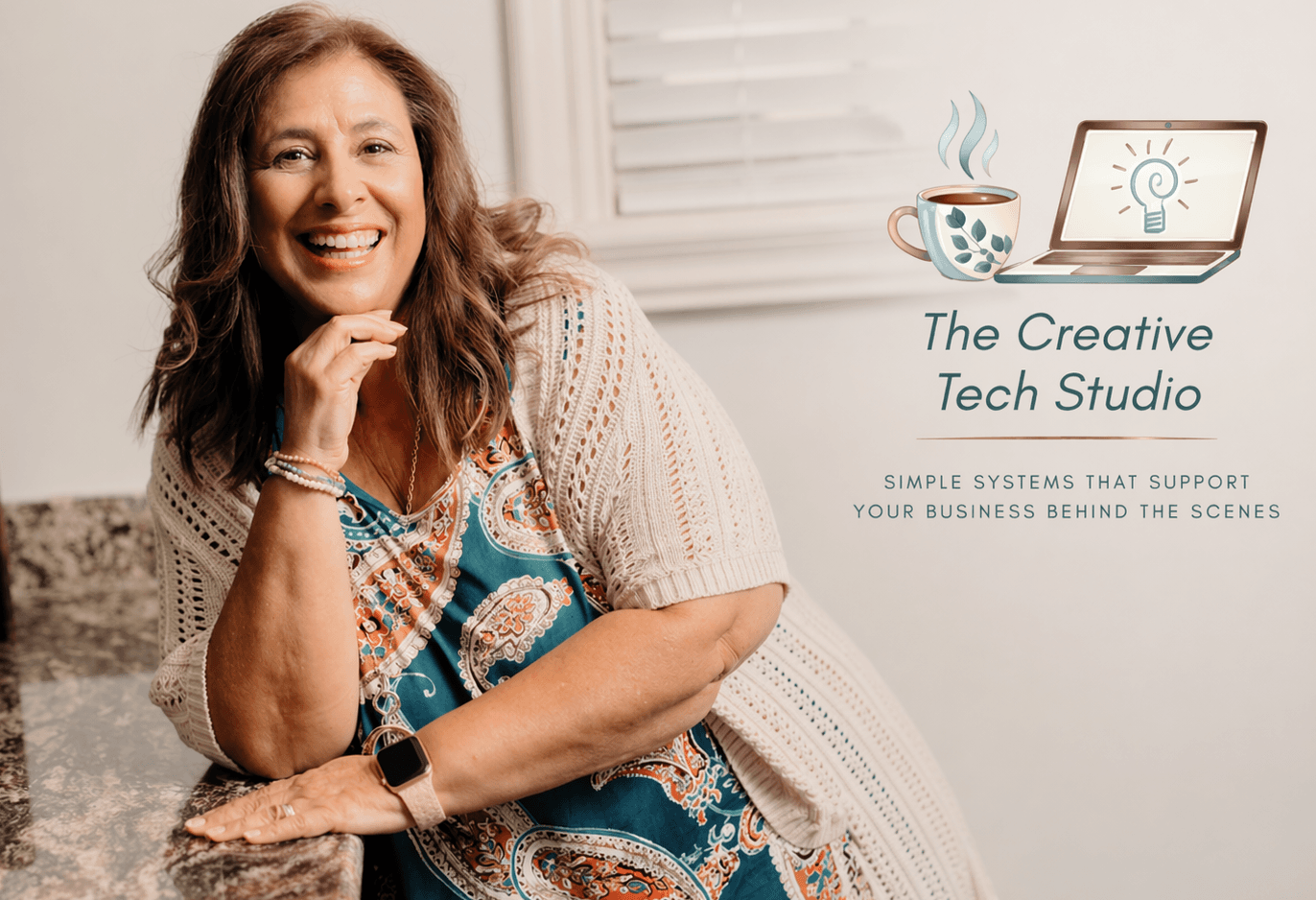Janet Farmer smiling and leaning on a counter with logo to the right for the creative tech studio