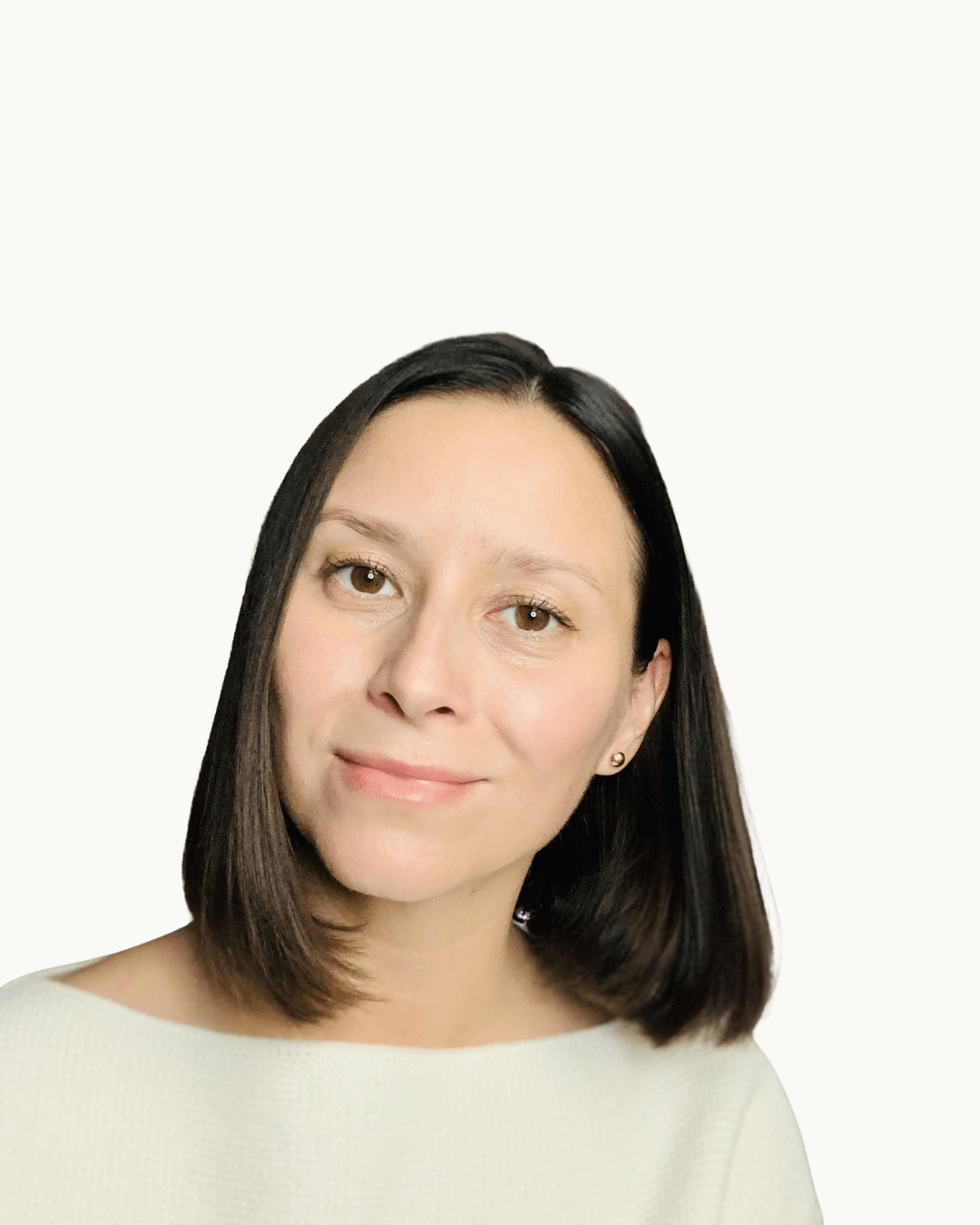 Tímea, founder of Face Wellness, practicing a gentle facial relaxation ritual.