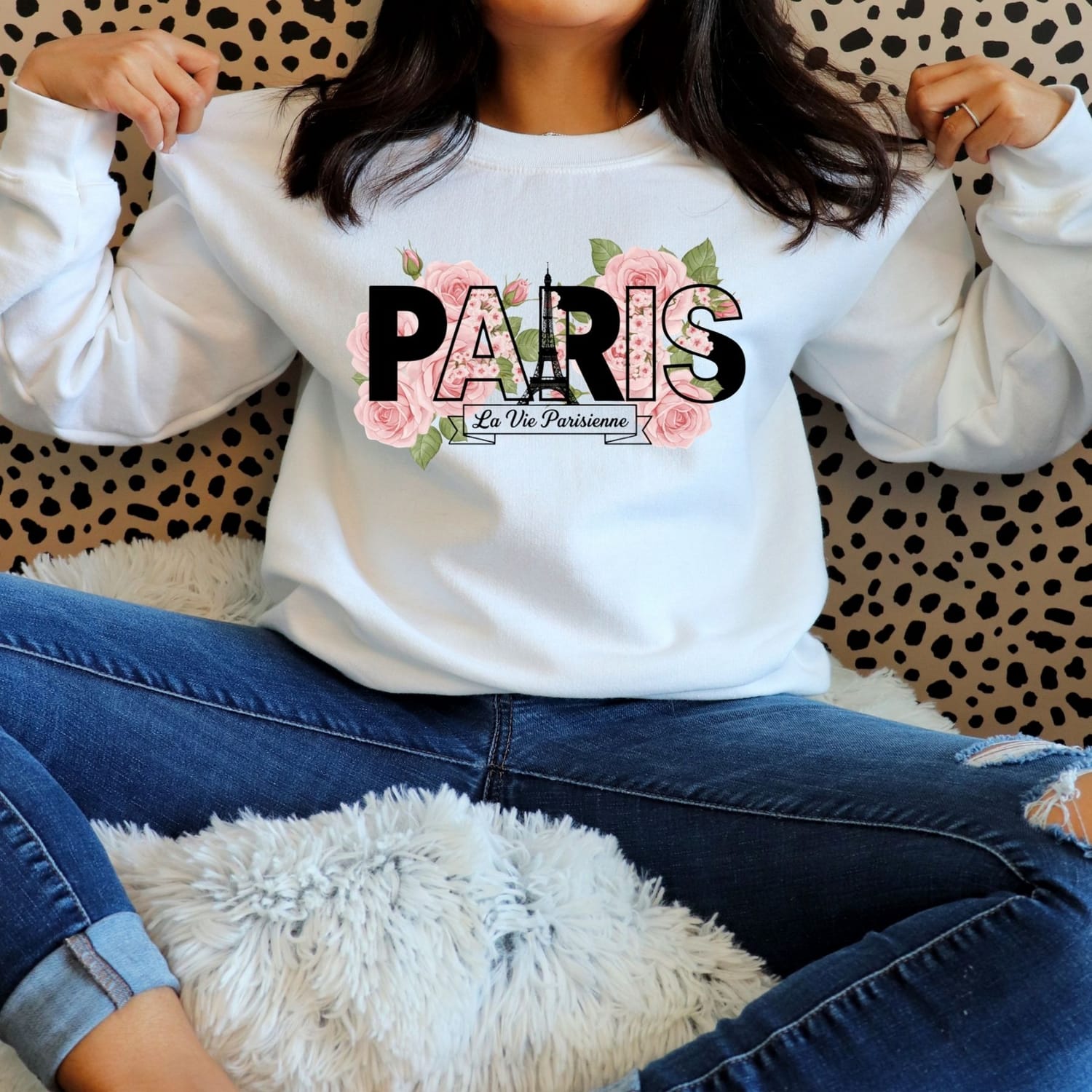 White sweatshirt with 'Paris La Vie Parisienne' and pink flowers