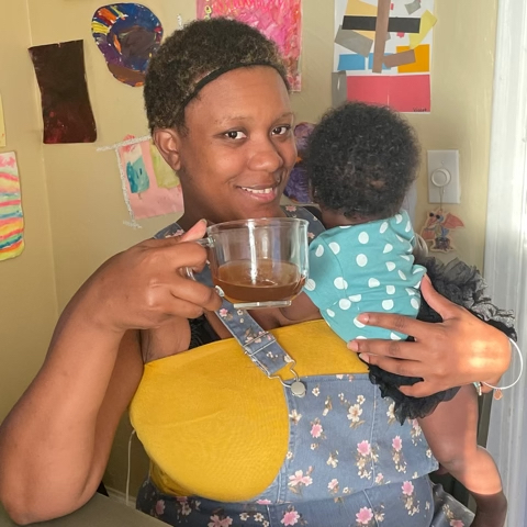 Breastfeeding mom drinking lactation tea