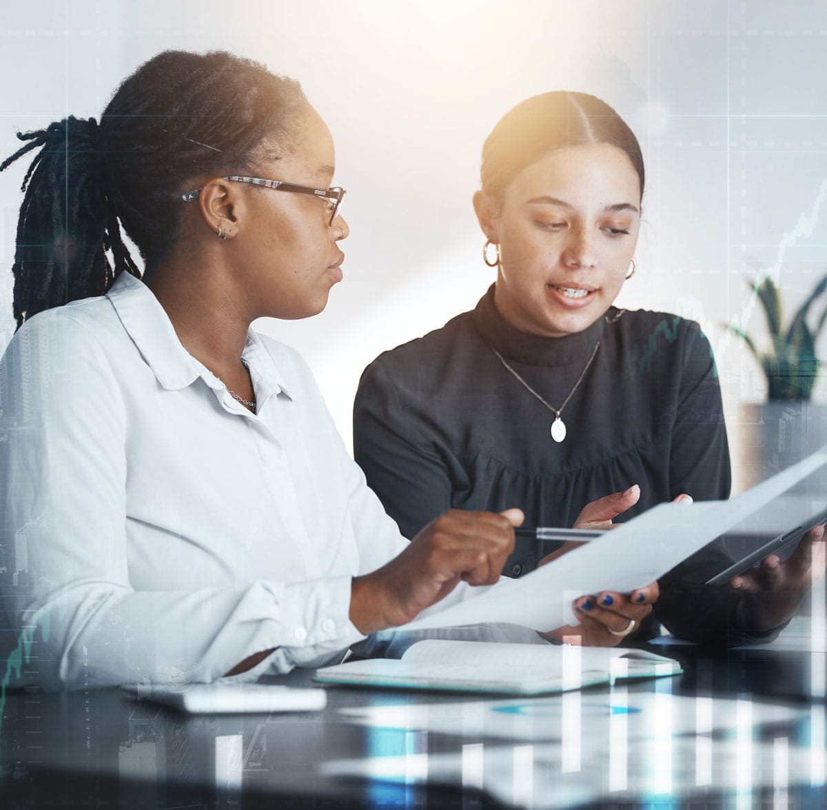 Two woman reviewing documents