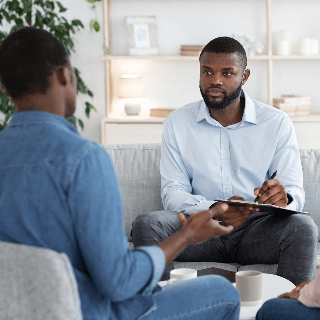 Advisor preparing study documents with a client