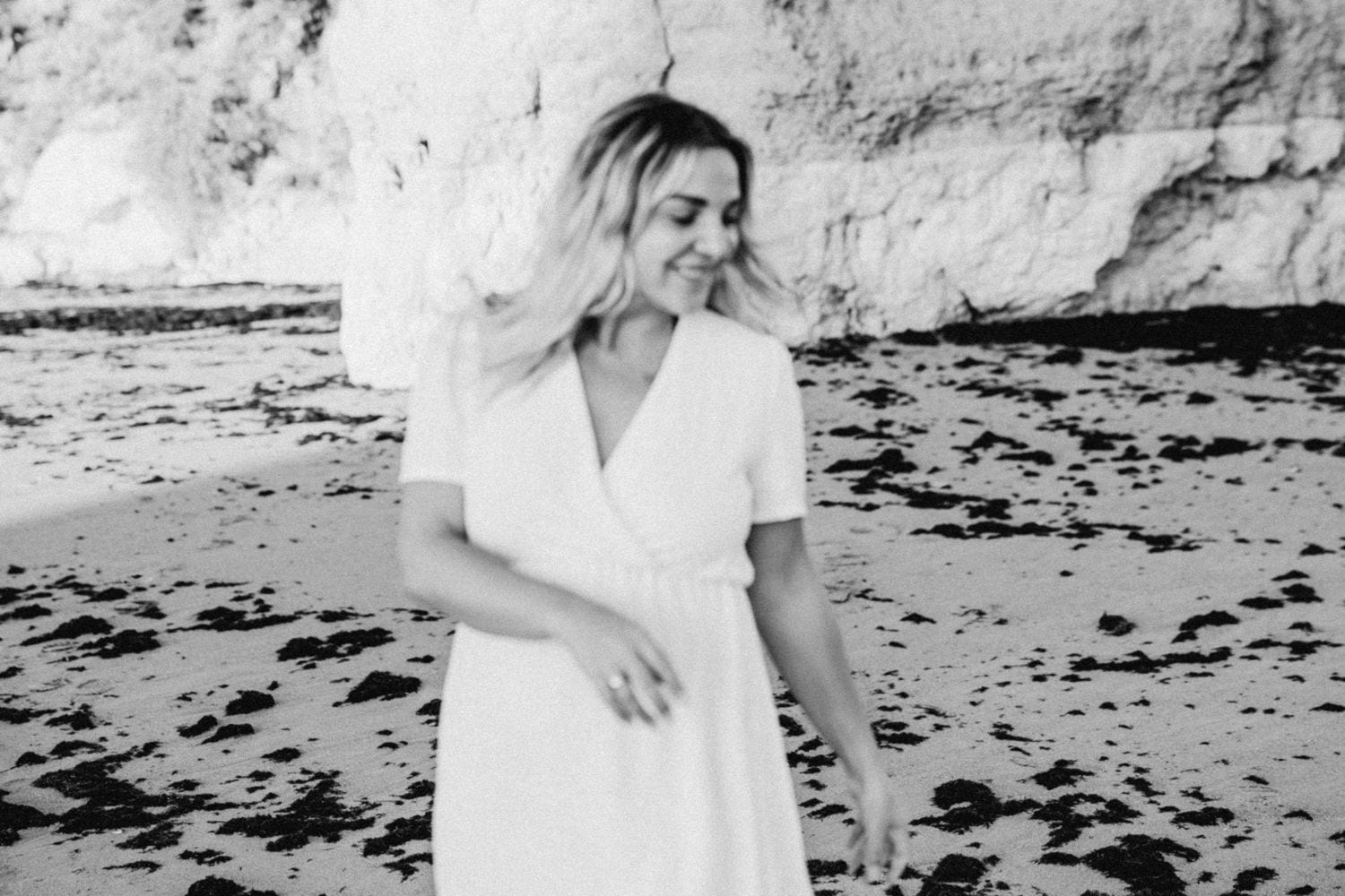 Val&eacute;rie laughing by the cliffs