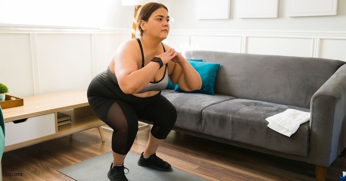 A woman doing squats in her living room