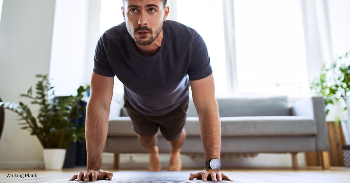 A man in the walking plank position