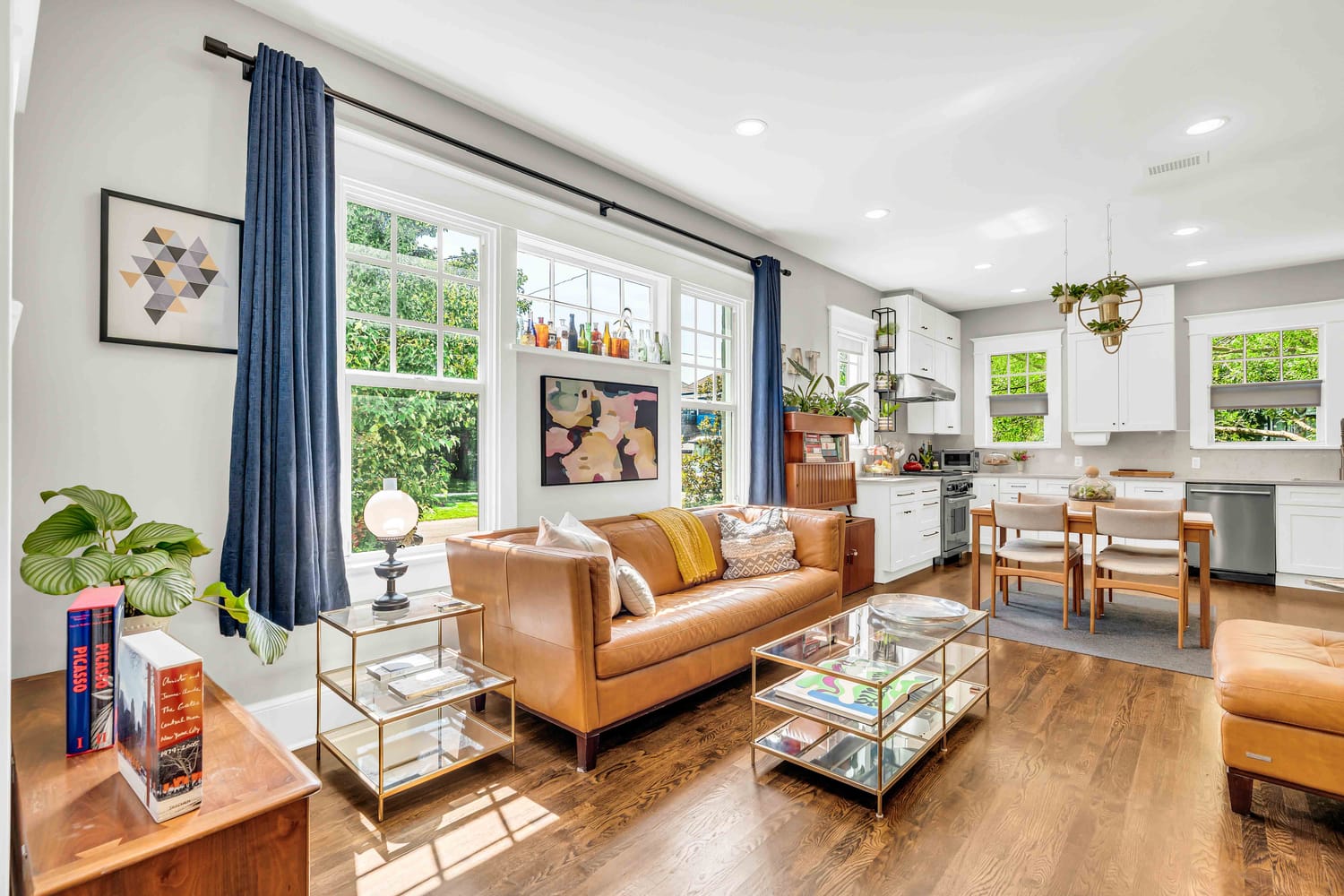 Wide-angle interior shot of an open-concept living and dining area pinned in Saint Augustine