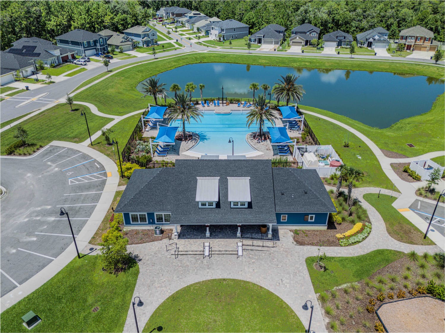 Wide-angle aerial neighborhood view of a master-planned community in Florida, showing local amenities and street layout.