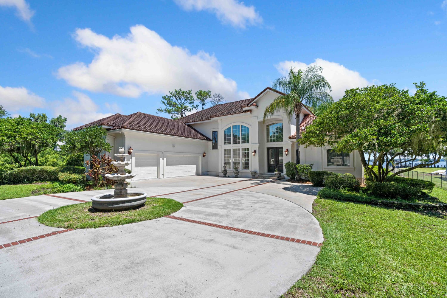 Wide-angle architectural shot of a residential property facade pinned in Saint Augustine, Florida