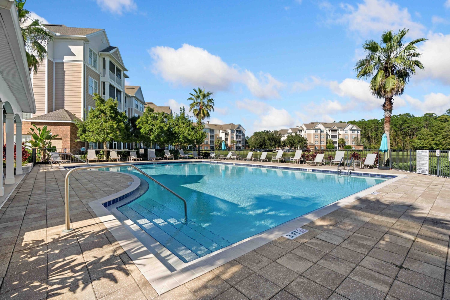 Professional photography of a custom swimming pool and amenities at a luxury Jacksonville listing