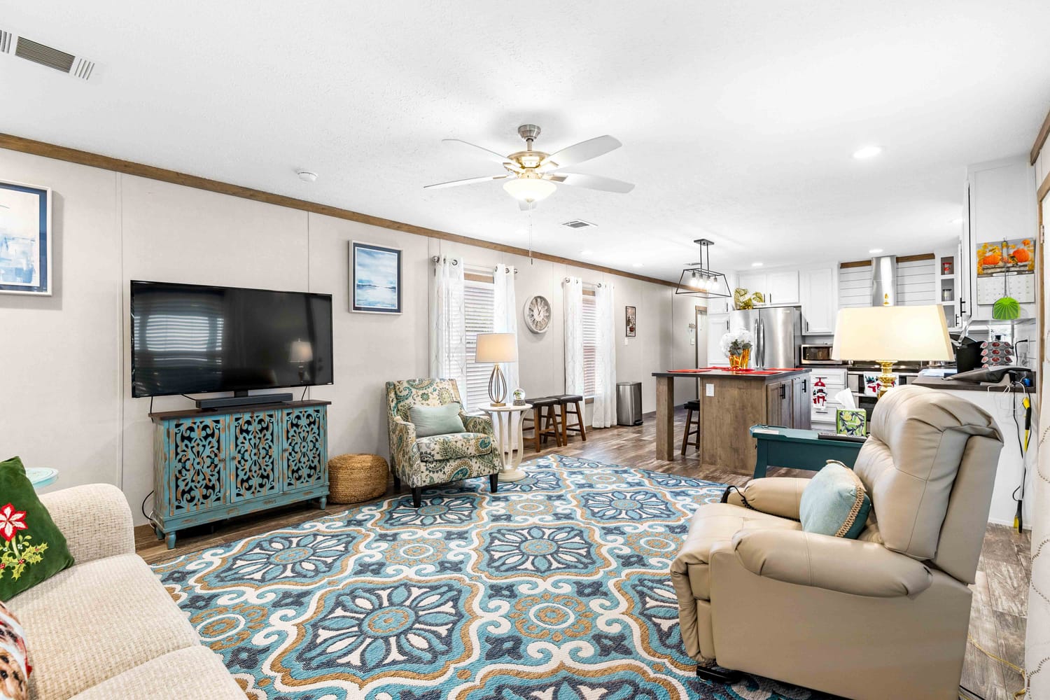 Wide-angle interior shot of an open-concept living and dining area pinned in Saint Augustine.