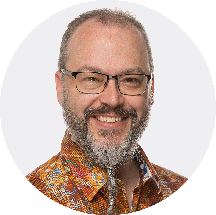 Jim Cook, music production educator and lead mentor smiling in a professional headshot.