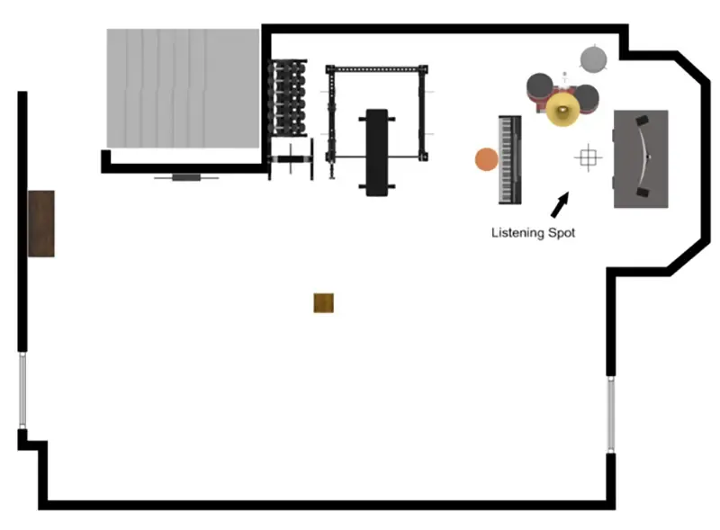 Floor plan map of a home basement studio layout showing a desk setup in an offset corner.