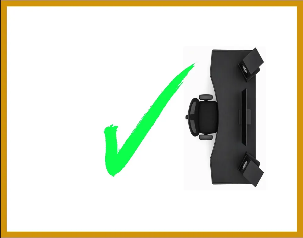 Top-down diagram of a studio desk positioned facing the short wall with a green checkmark representing a proper room position.