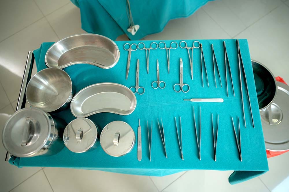 Surgical instruments neatly arranged on a tray illustrating efficient DAW template workflow organization