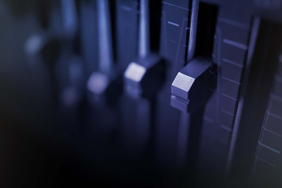 A close-up of a graphic equalizer hardware unit.