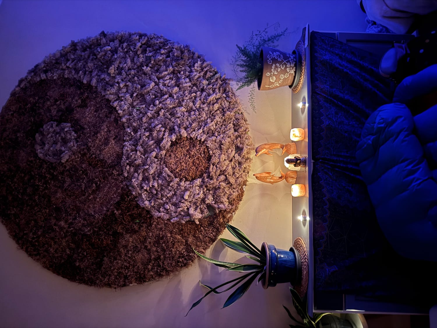 The altar and ceremony space, candlelit