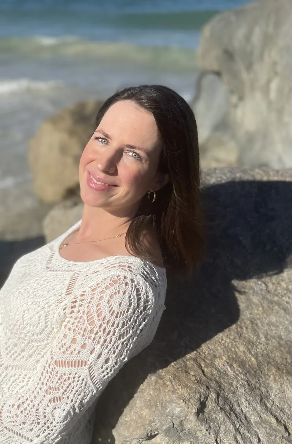Natalie, founder of Feng Shui Balance, at home in a softly lit room