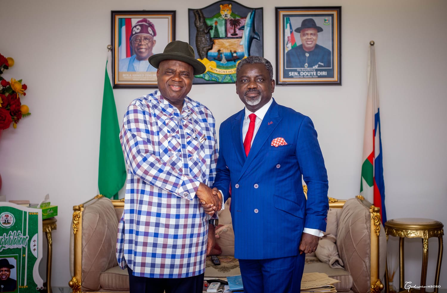 With Gov. Diri