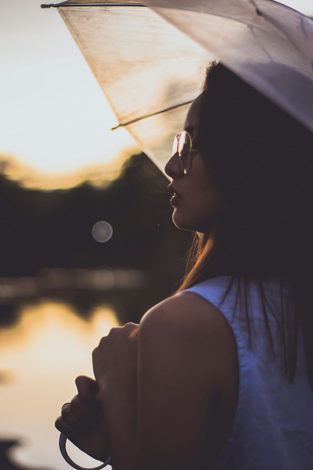 Photo by <a href="https://unsplash.com/@kingjaizer?utm_source=unsplash&utm_medium=referral&utm_content=creditCopyText">Jaizer Capangpangan</a> on <a href="https://unsplash.com/photos/woman-in-white-sleeveless-top-holding-umbrella-looking-up-C21uhO6VwEs?utm_source=unsplash&utm_medium=referral&utm_content=creditCopyText">Unsplash</a>       