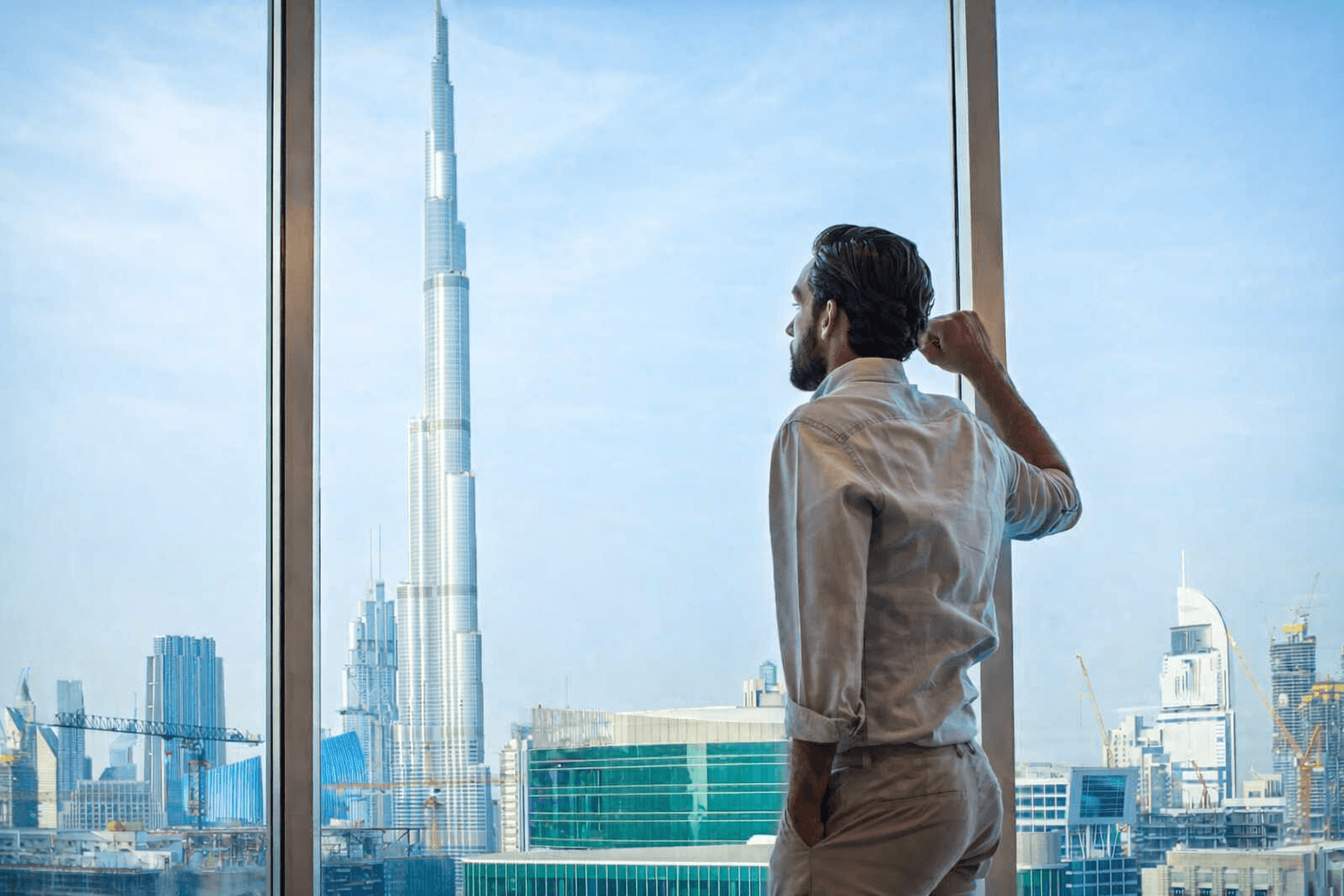 Professional looking out over the Dubai skyline