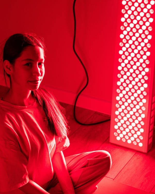 A red light panel on a floor stand in a home room