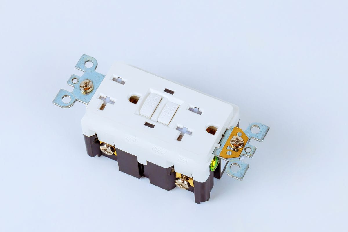 A GFCI receptacle with test and reset buttons