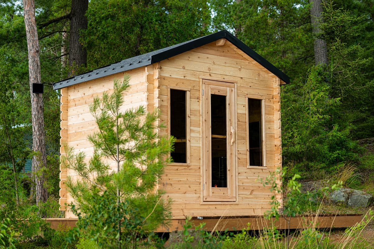Dundalk CT Georgian cabin sauna on a wooden deck in the woods