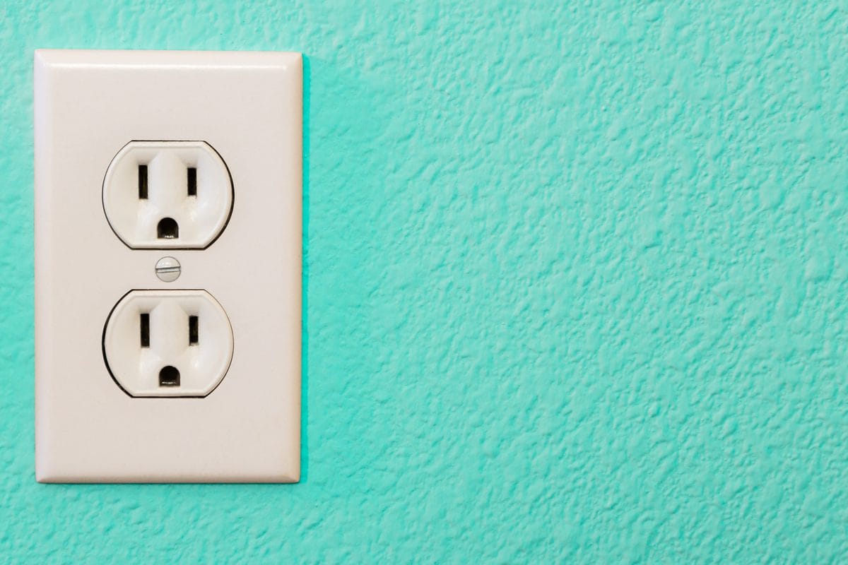 A standard U.S. wall outlet with two receptacles