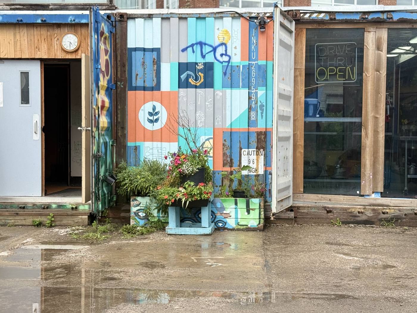 The colourful shipping containers that house the kitchen