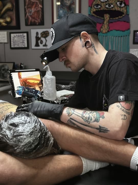 Alec Smith, tattoo artist at Desire Art and Ink