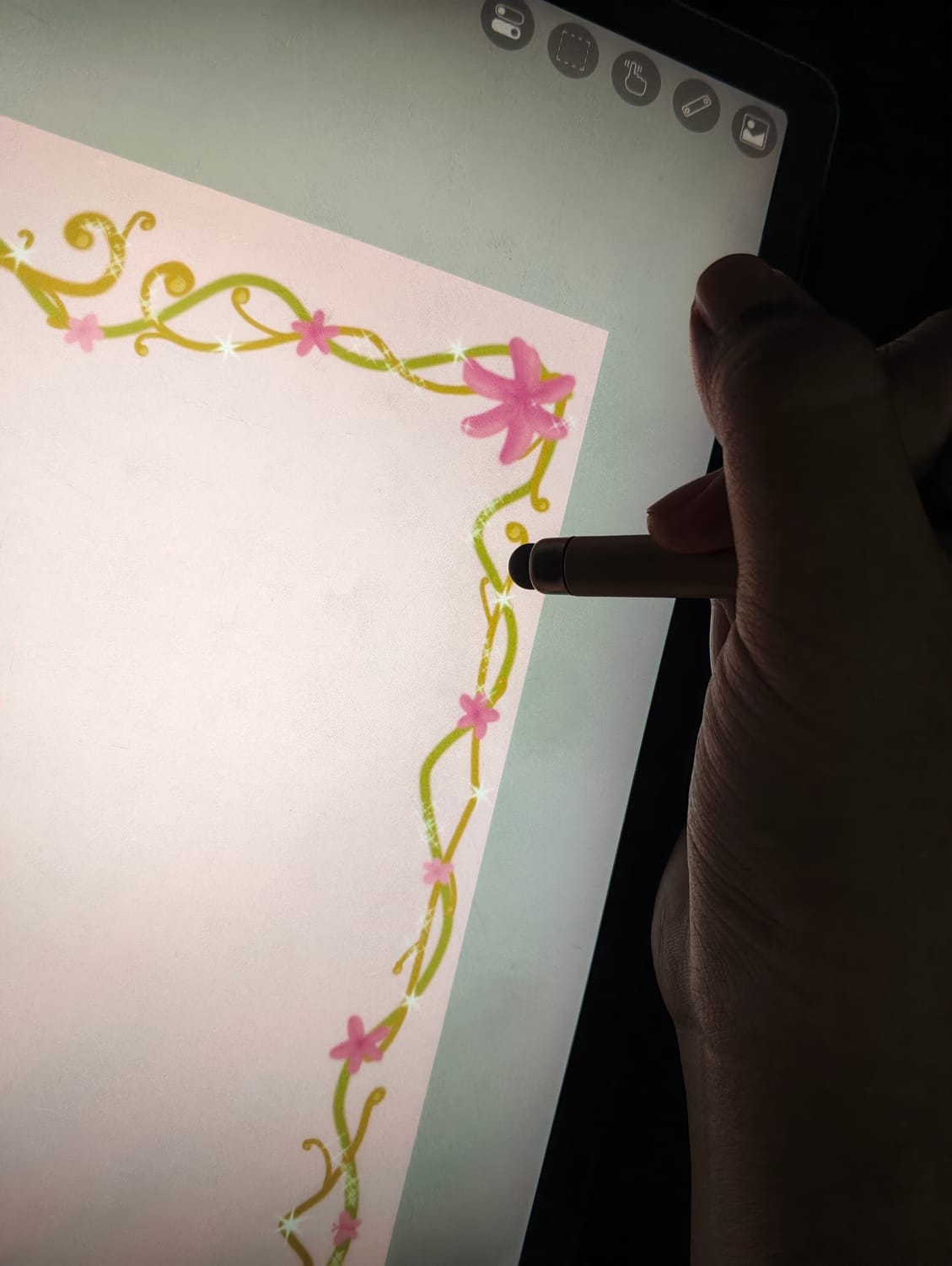 Annelya is designing a custom book cover for her best friend's, Angie Lovey, birthday