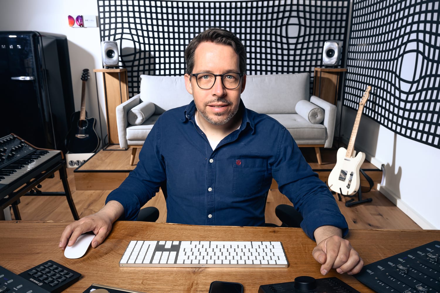 Eric Horstmann at the mixing desk in his Atmos studio