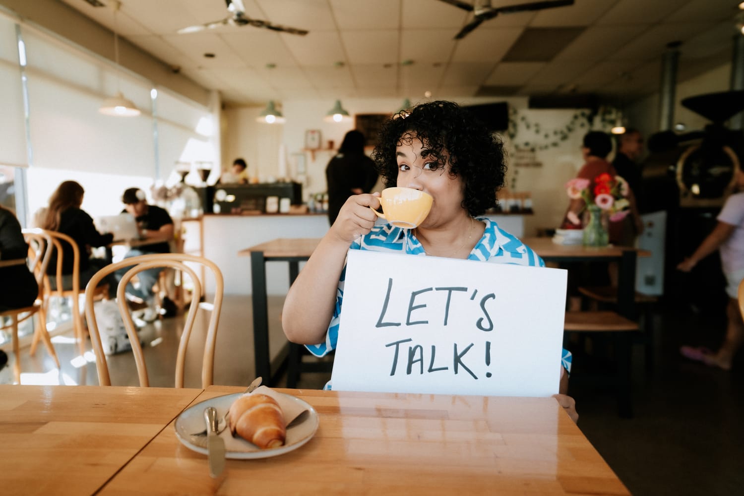 Sanam Permal at a café ready to talk