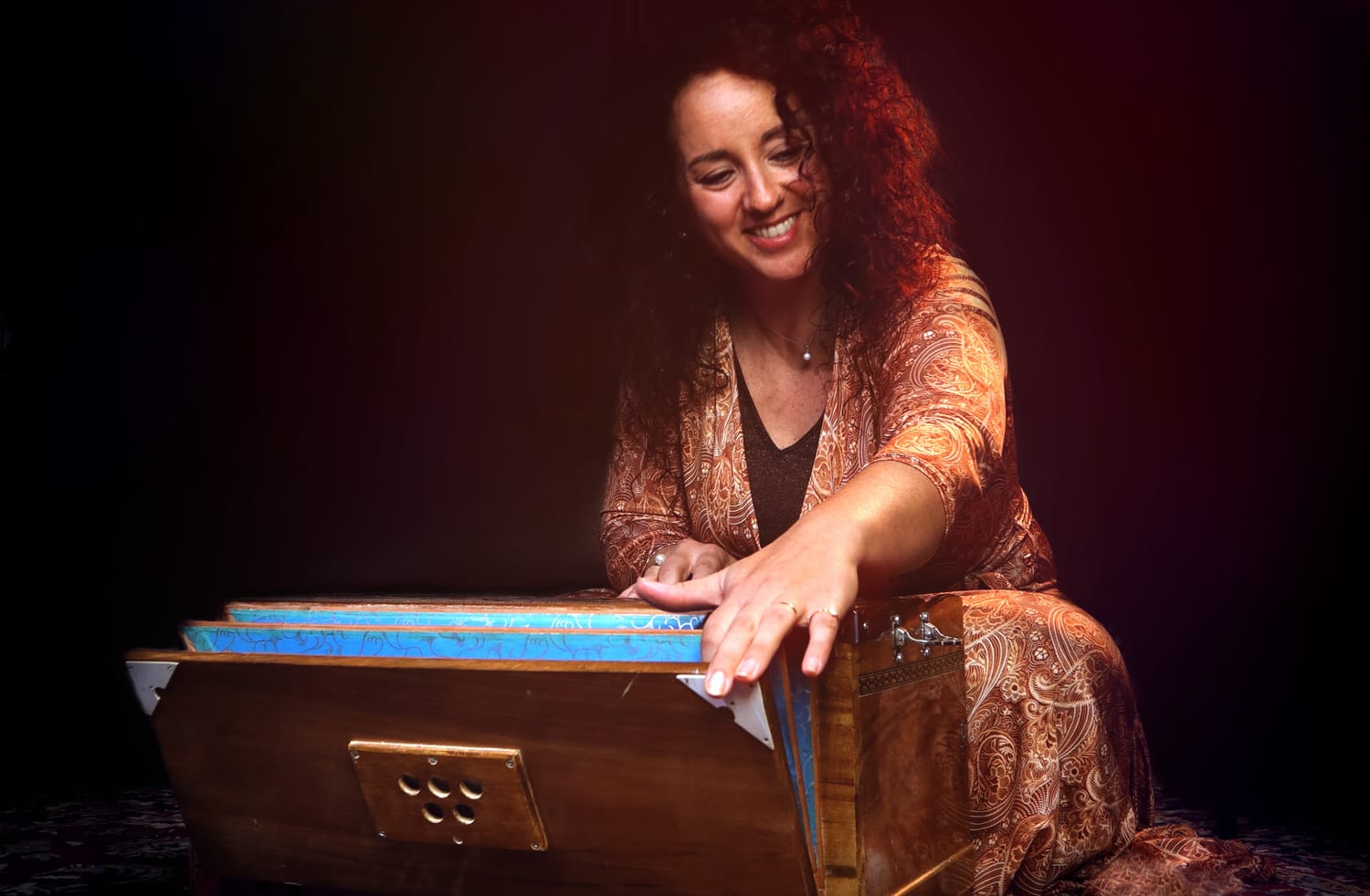 Playing harmonium with joy
