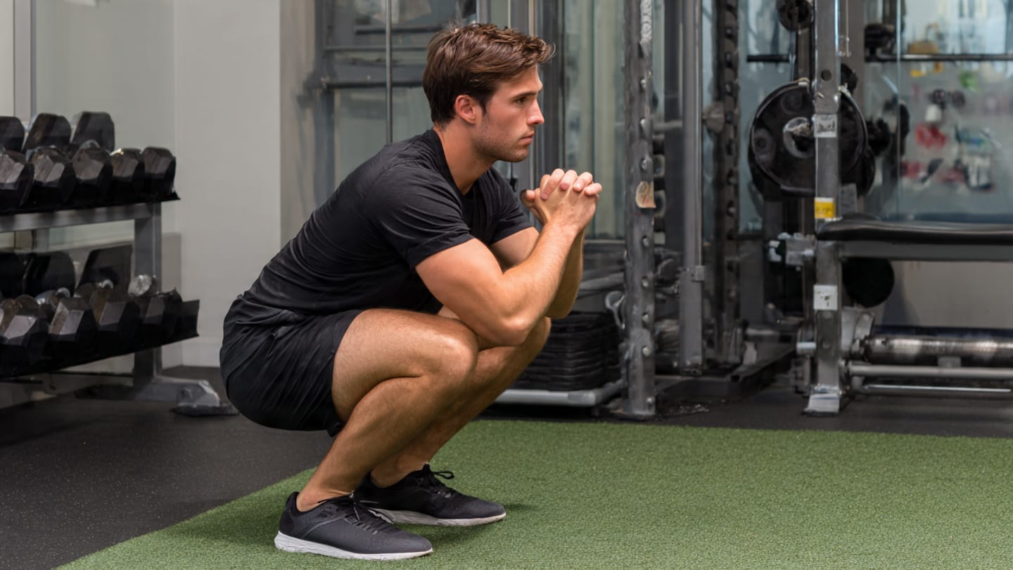 Person performing goblet squats, one of the awesome exercises and tips to reduce butt fat.