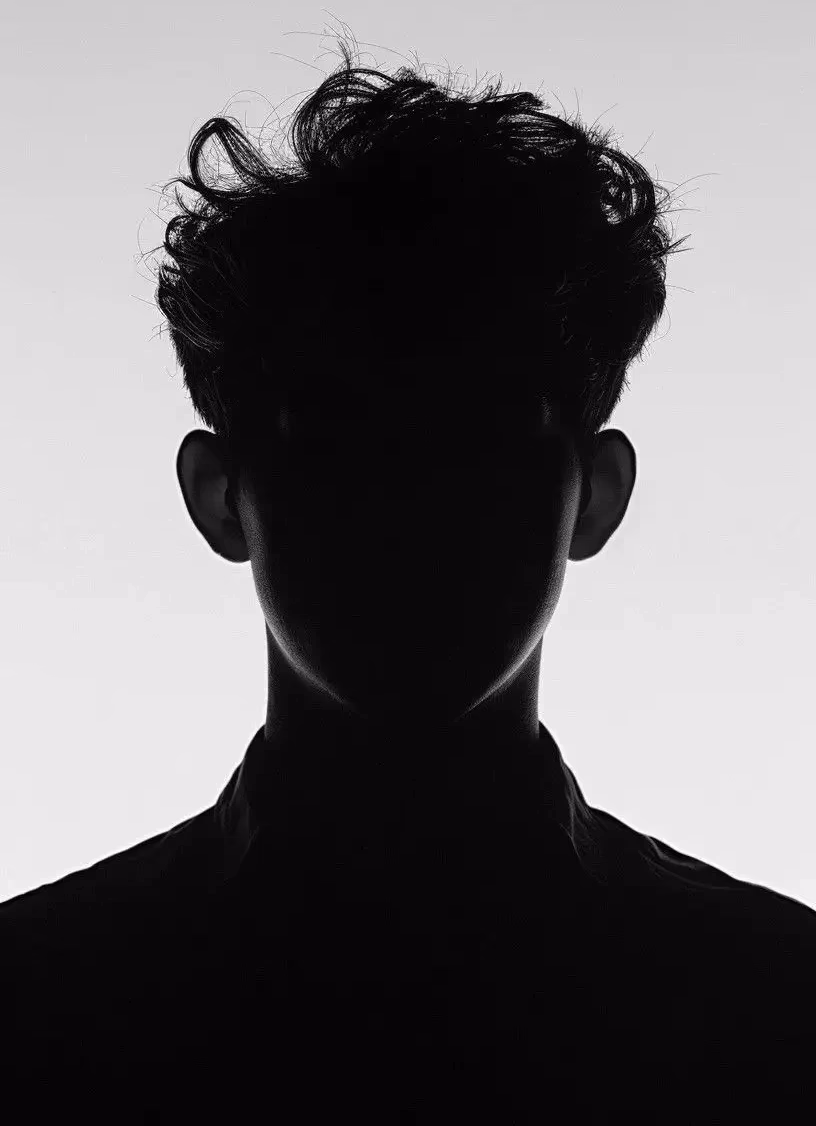 Close-up portrait in dramatic lighting