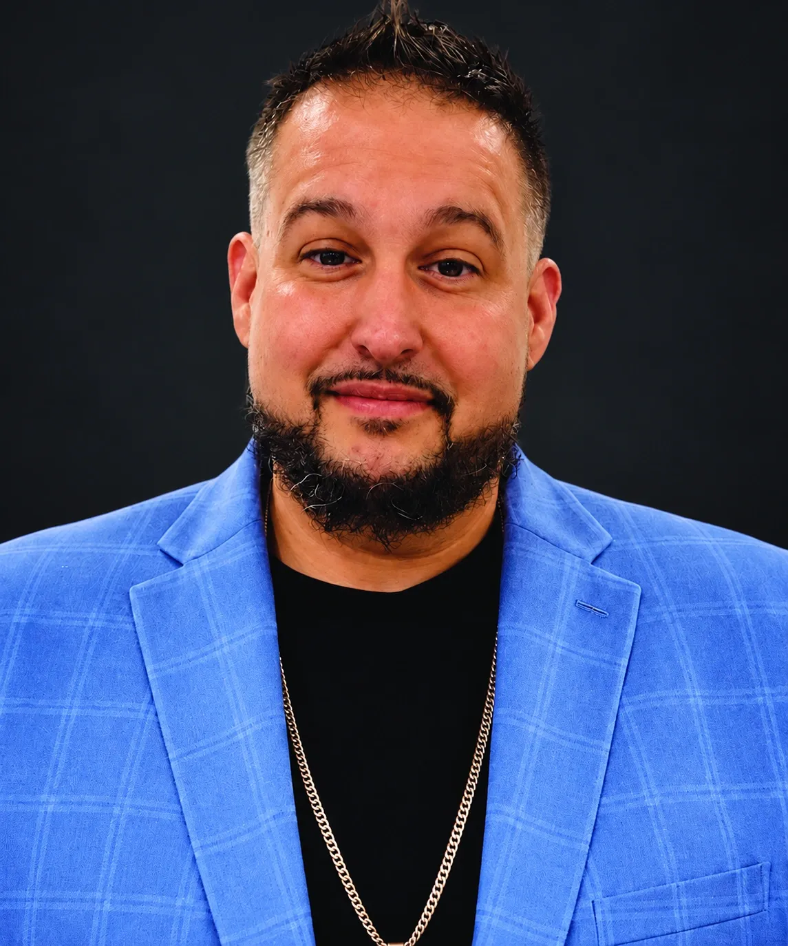 Randi Rodriguez wearing a blue jacket