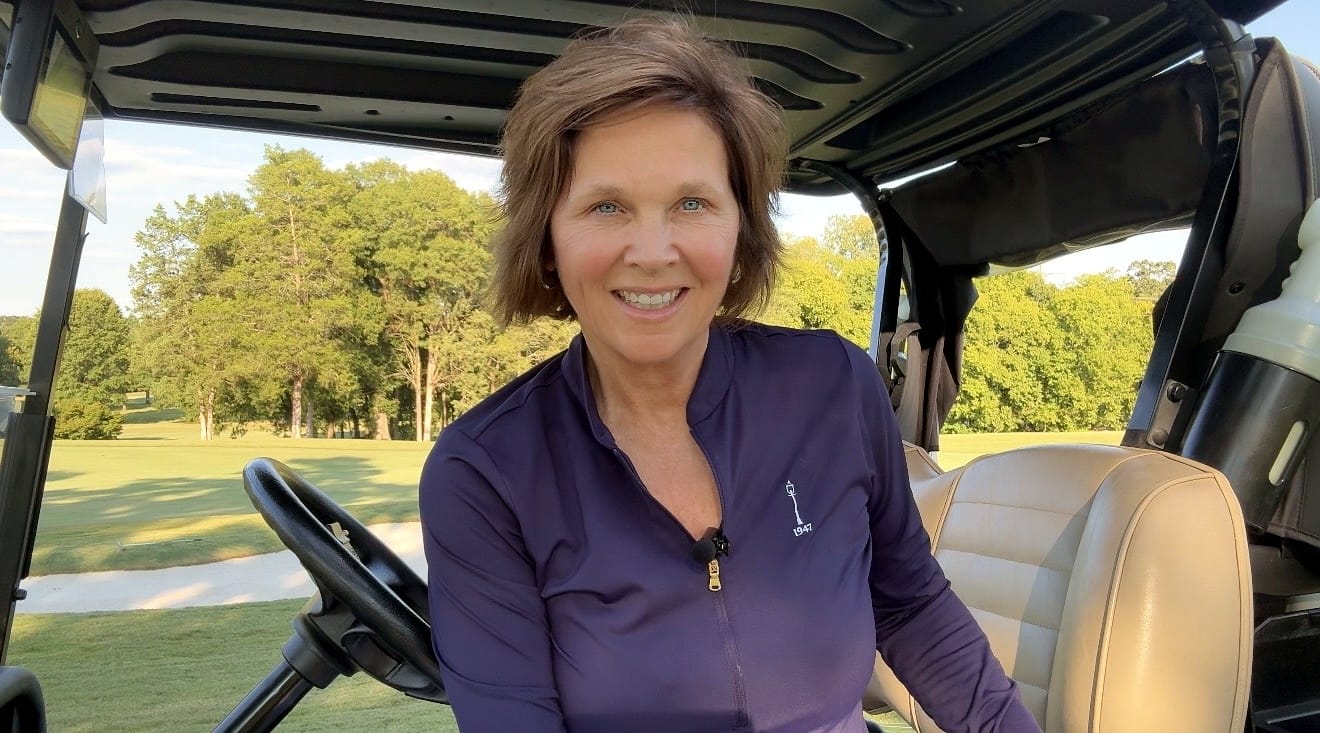 Coach Kathy Hart on the golf course