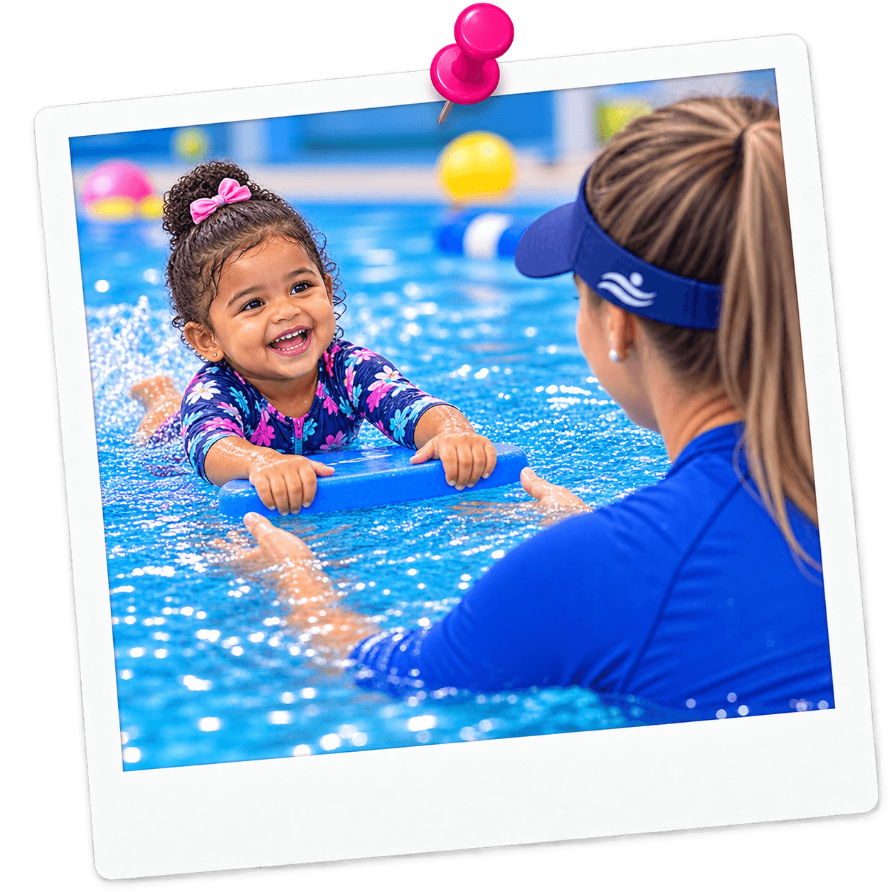 Toddler swimming with an instructor