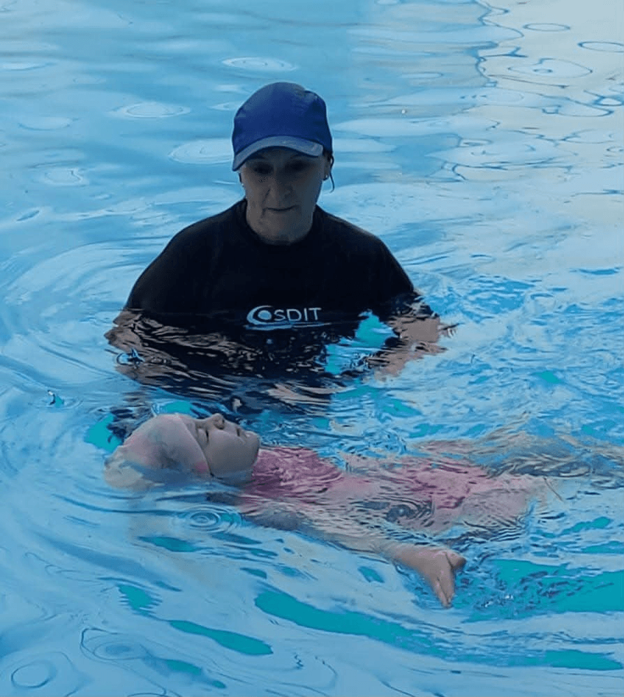 A little one learning to float with Ina