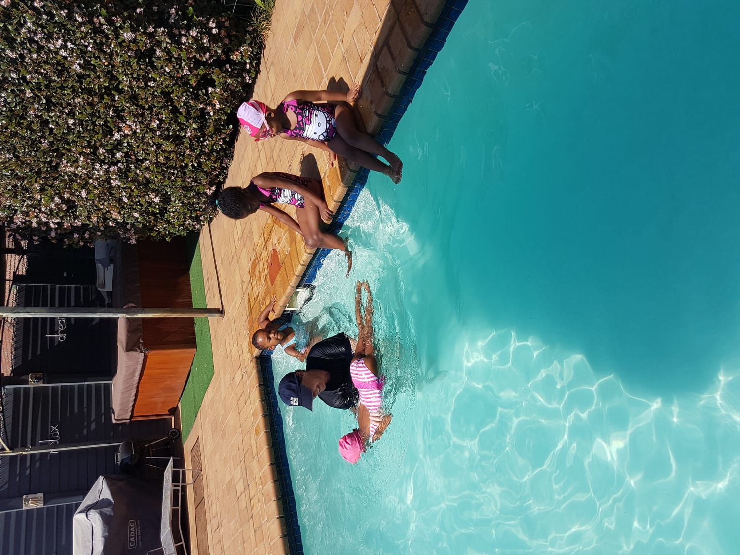 Gail in the pool with little swimmers