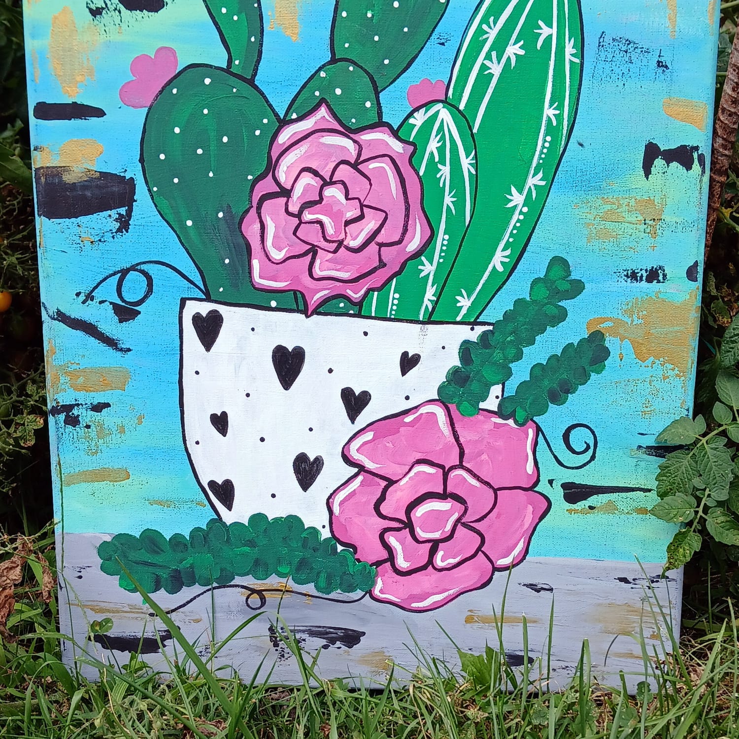 Painting by Elissa: pink roses and a cactus in a heart-patterned pot