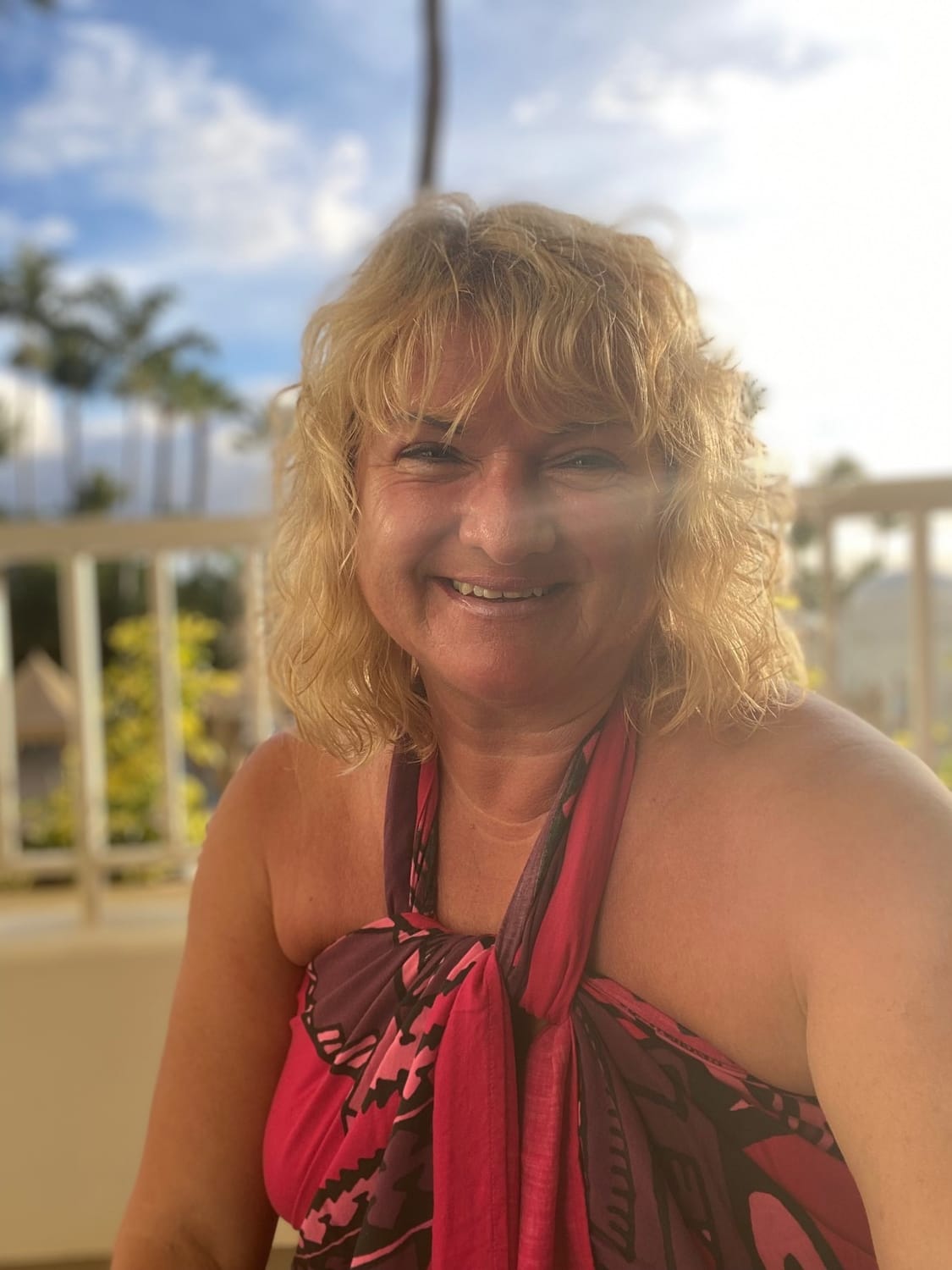 warm smiling hawaiian woman portrait flower crown