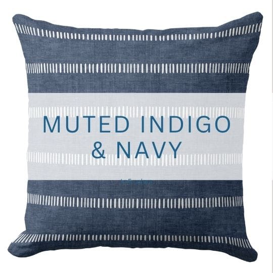 A muted indigo/navy blue throw pillow in a modern style.