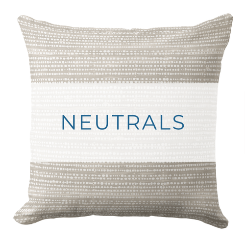 A royal blue throw pillow in a coastal style.