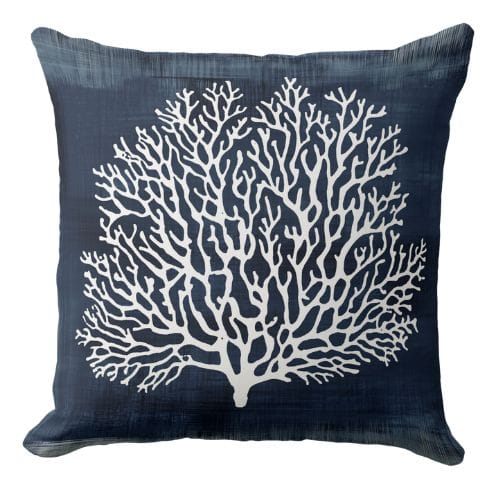 A navy blue and white throw pillow in a modern coastal style.